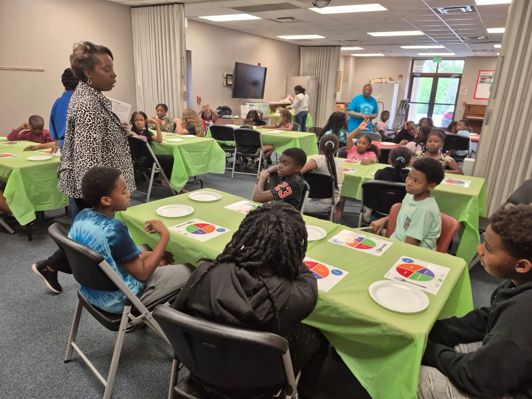 Children learning about balanced meals during a Happy Healthy Kids class