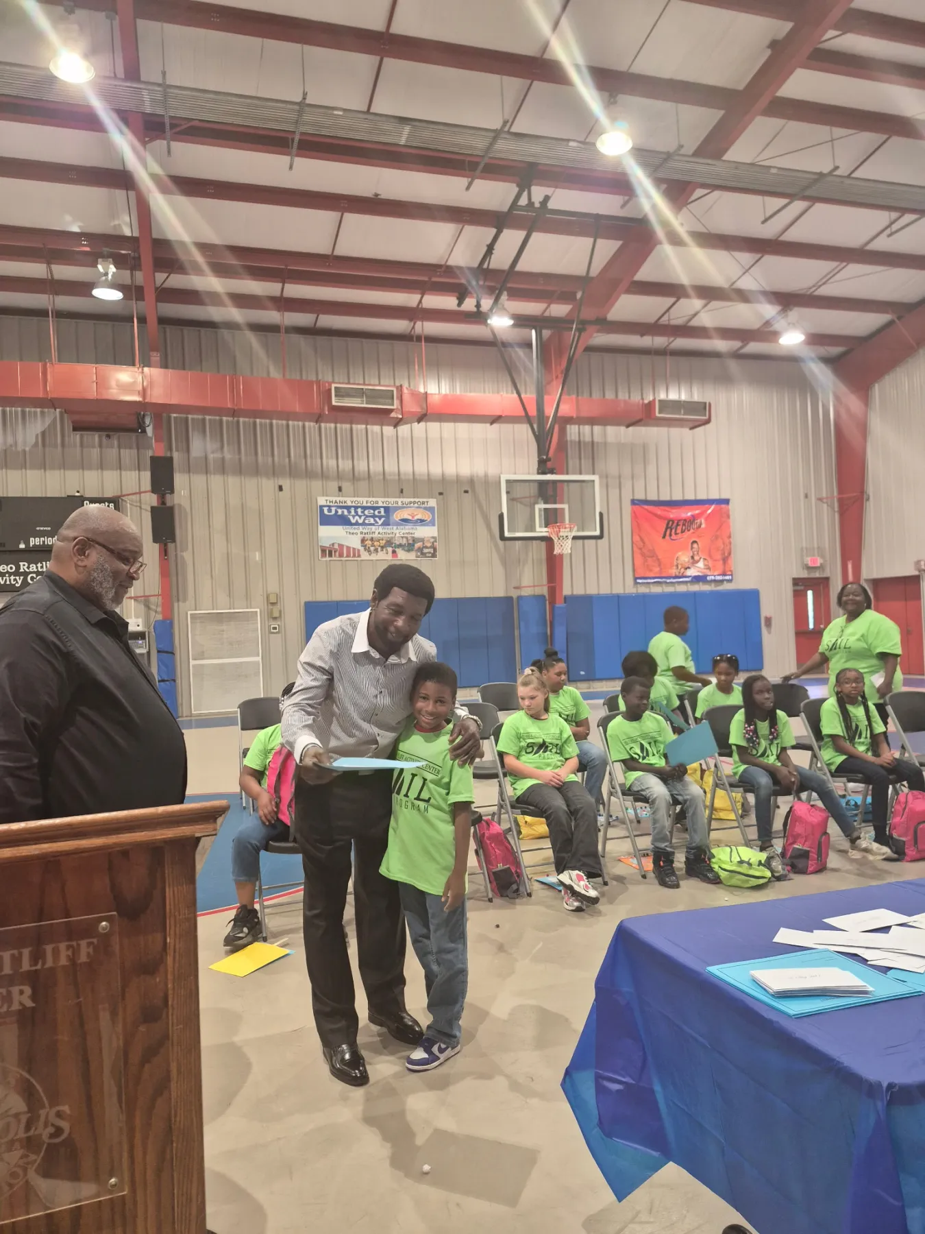 A SAIL student receiving recognition at the program celebration