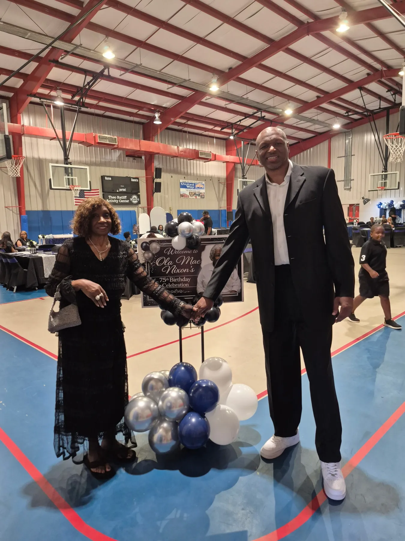 Theo Ratliff with his mother, Camilla Ratliff Eatmon, inside the activity center